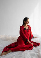 A woman wearing Midnight silk gown – dark blue women’s nightgown by LaRosa