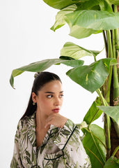 A woman wearing Grace silk pajama set – luxury women’s nightwear by LaRosa