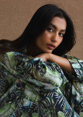 A woman wearing Tropical Ocean silk pajama set – ocean print women’s nightwear by LaRosa