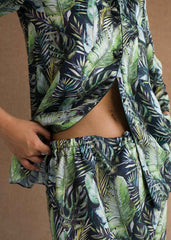 A woman wearing Tropical Ocean silk pajama set – ocean print women’s nightwear by LaRosa