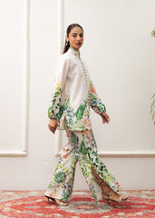A woman modeling a floral print co-ord set with a mandarin collar and flared cut trousers.
LaRosa Summer Dreams Delia white cotton loungewear set for women.
side View