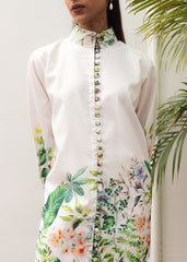 A woman modeling a floral print co-ord set with a mandarin collar and flared trousers.
LaRosa Summer Dreams Delia white cotton loungewear set for women.
closeup