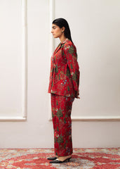 A Women wearing a double-breasted red coat with prints and culottes.
LaRosa Summer Dreams Janessa red cotton nightwear set for women, designed as a bold printed co-ord with collared shirt and straight trousers.
side view