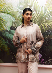 A female model wearing a beige printed co-ord set with a buttoned down shirt and flared trousers.
LaRosa Summer Dreams Isla grey cotton loungewear set for women.